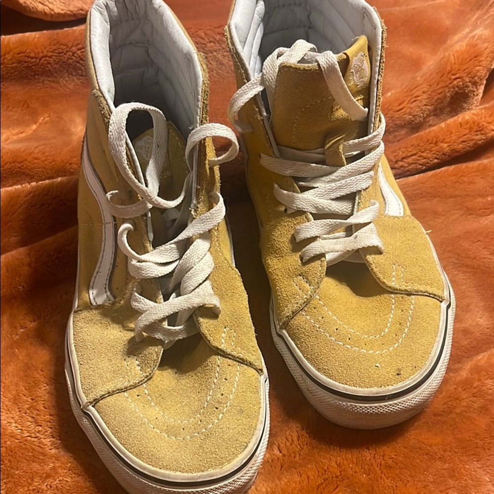 Yellow High-Top Sneakers with White Laces.   Vans